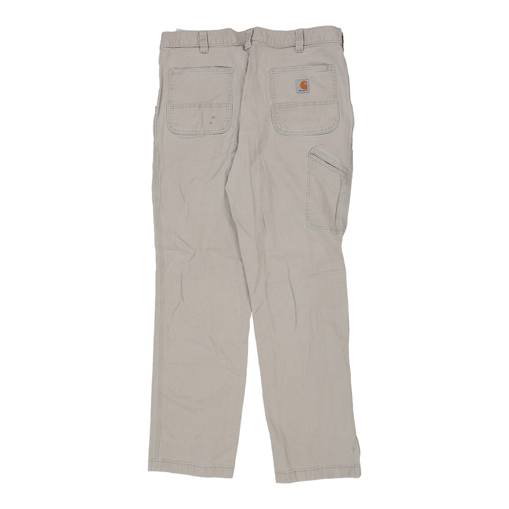 Buy Carhartt Trousers - 38W 34L Beige Cotton Blend Refurbished - $63.90 Carhartt Trousers - 38W 34L Beige Cotton Blend Refurbished - Thrifted (note: this is a term often used to describe second- refurbished available on Cerqular