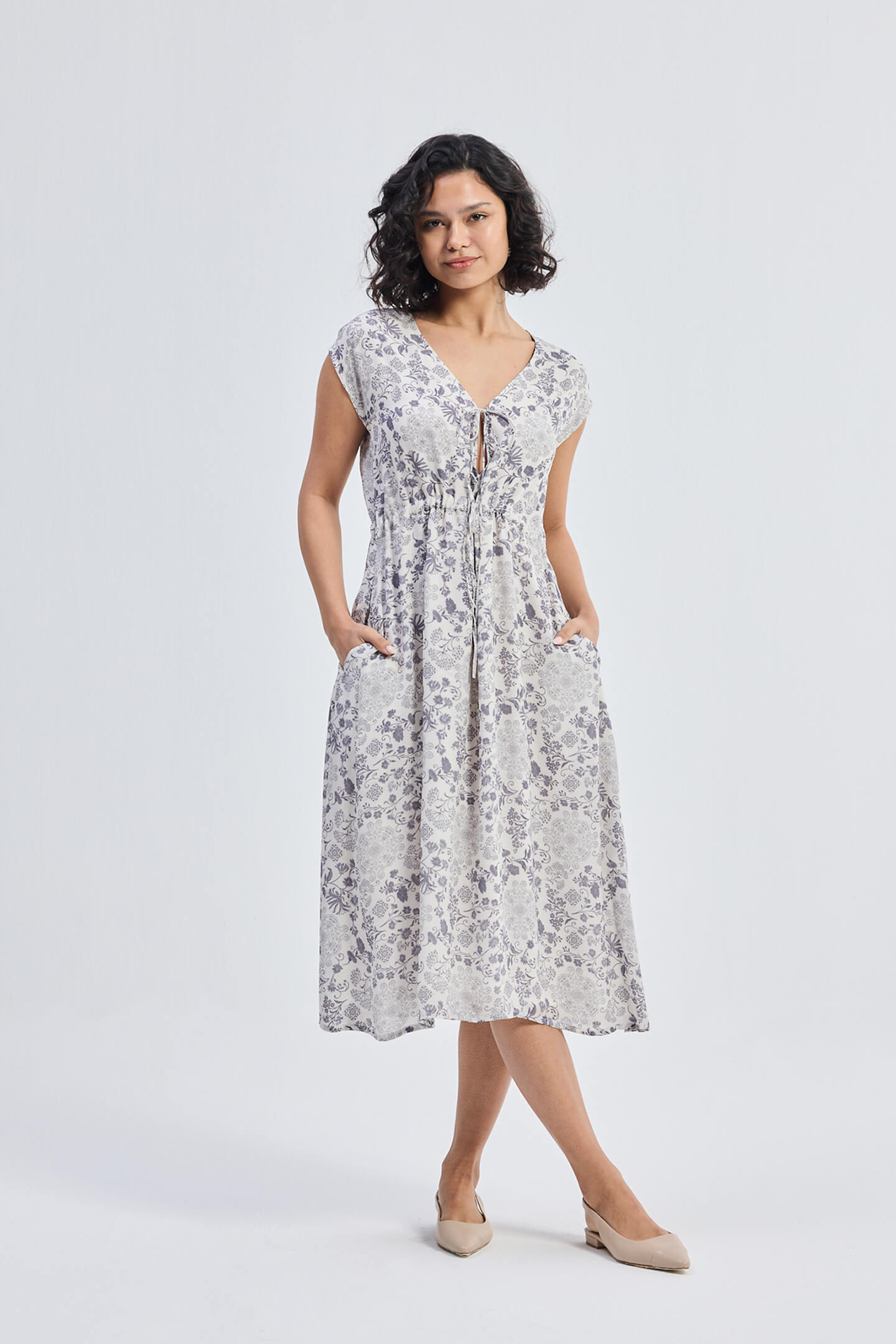 Deep V-neck Gathered Dress in Florals | Color: Blooming Tiles | Size: 3XL Refurbished - Resistor (Note: This is a generic term for an electronic component, refurbished available on Cerqular
