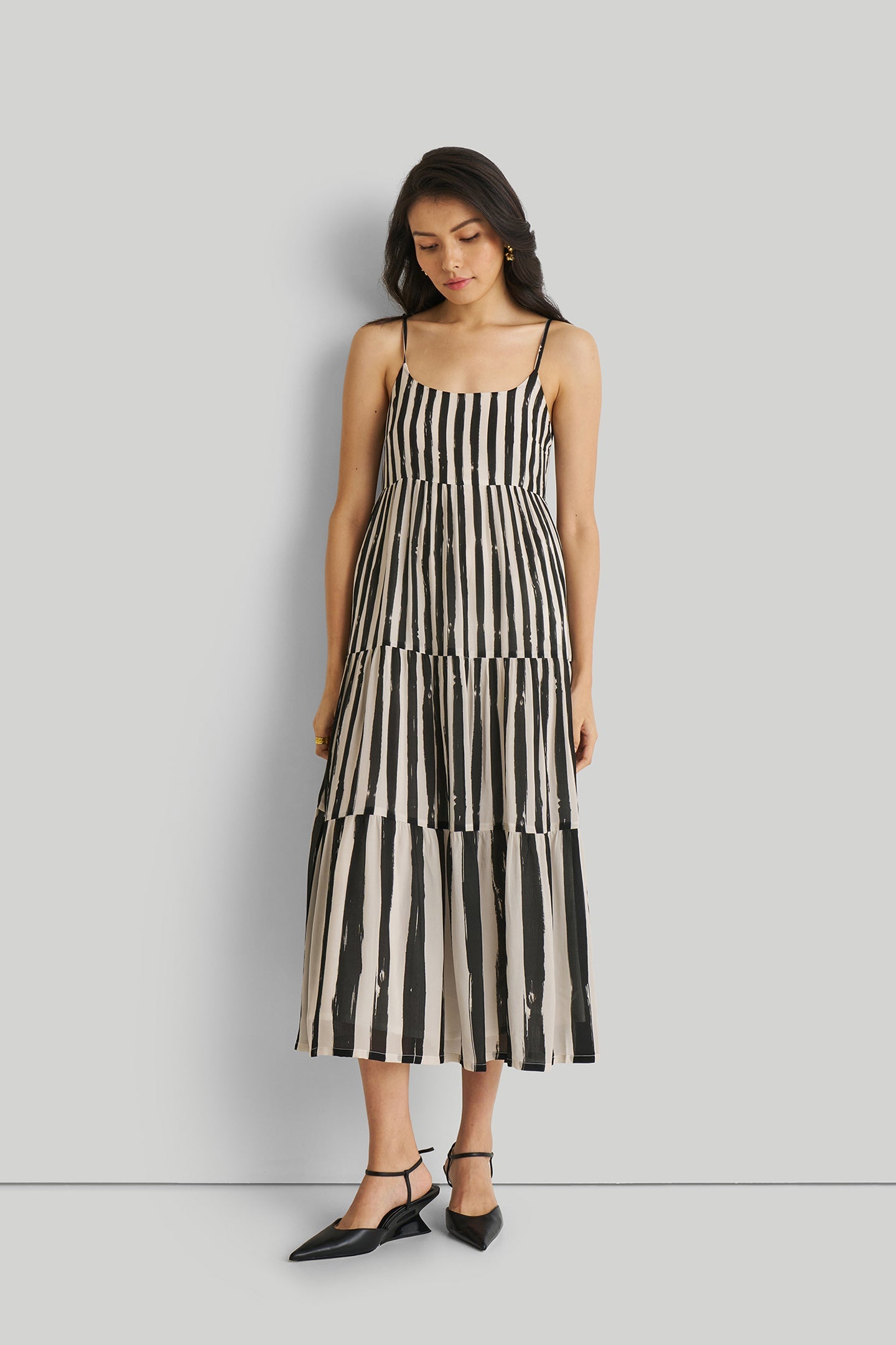 Buy Strappy Tiered Maxi Dress in Black Stripes | Color: Striped Down | Size: S Refurbished - $171.00 Strappy Tiered Maxi Dress in Black Stripes | Color: Striped Down | Size: S Refurbished - Resistor (Note: This is a generic term for an electronic component, refurbished available on Cerqular