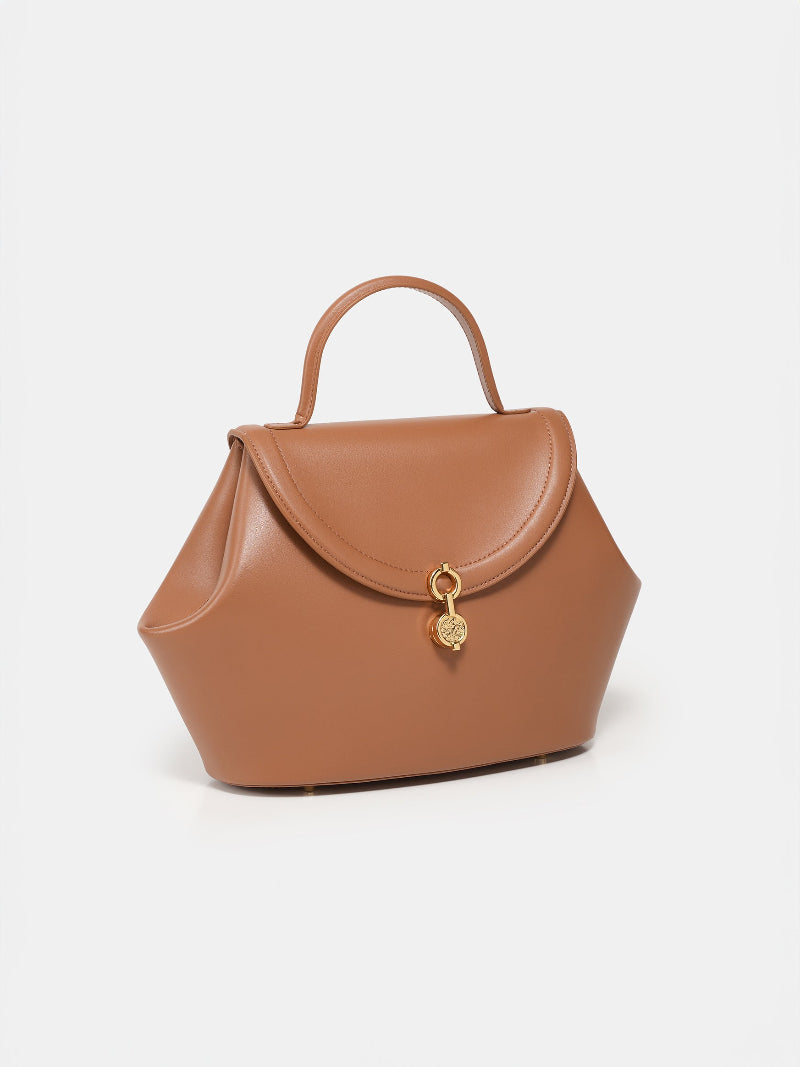 Buy The Miro Corn Leather Bag | Color: Tan Refurbished - $175.00 The Miro Corn Leather Bag | Color: Tan Refurbished - ONE (assuming it refers to the brand "ONE") refurbished available on Cerqular