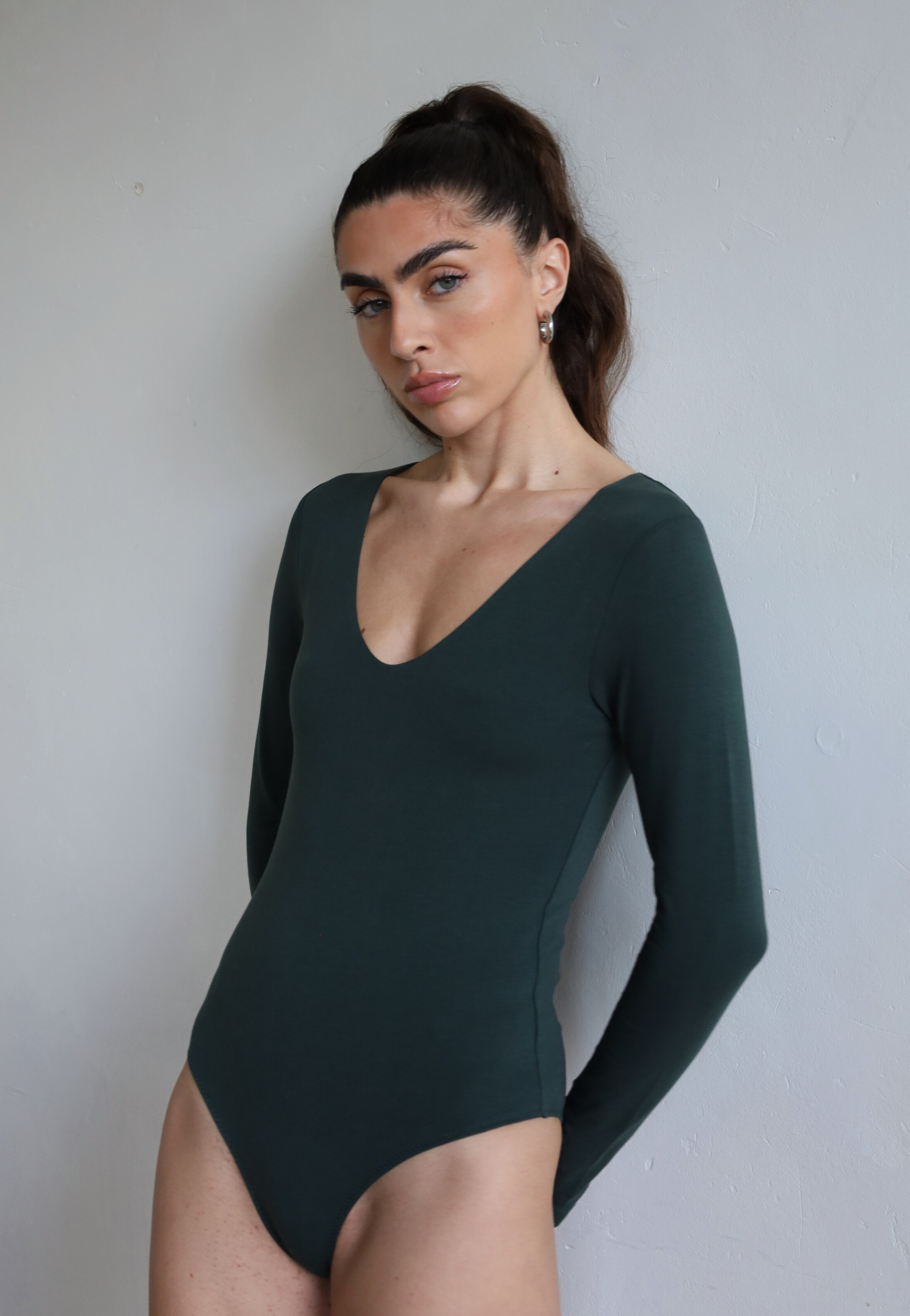 Buy Organic Cotton Long Sleeve V-Neck Bodysuit, Forest Green | Size: M Refurbished - $47.99 Organic Cotton Long Sleeve V-Neck Bodysuit, Forest Green | Size: M Refurbished - N/A (Note: It's possible that "Pantee" refurbished available on Cerqular