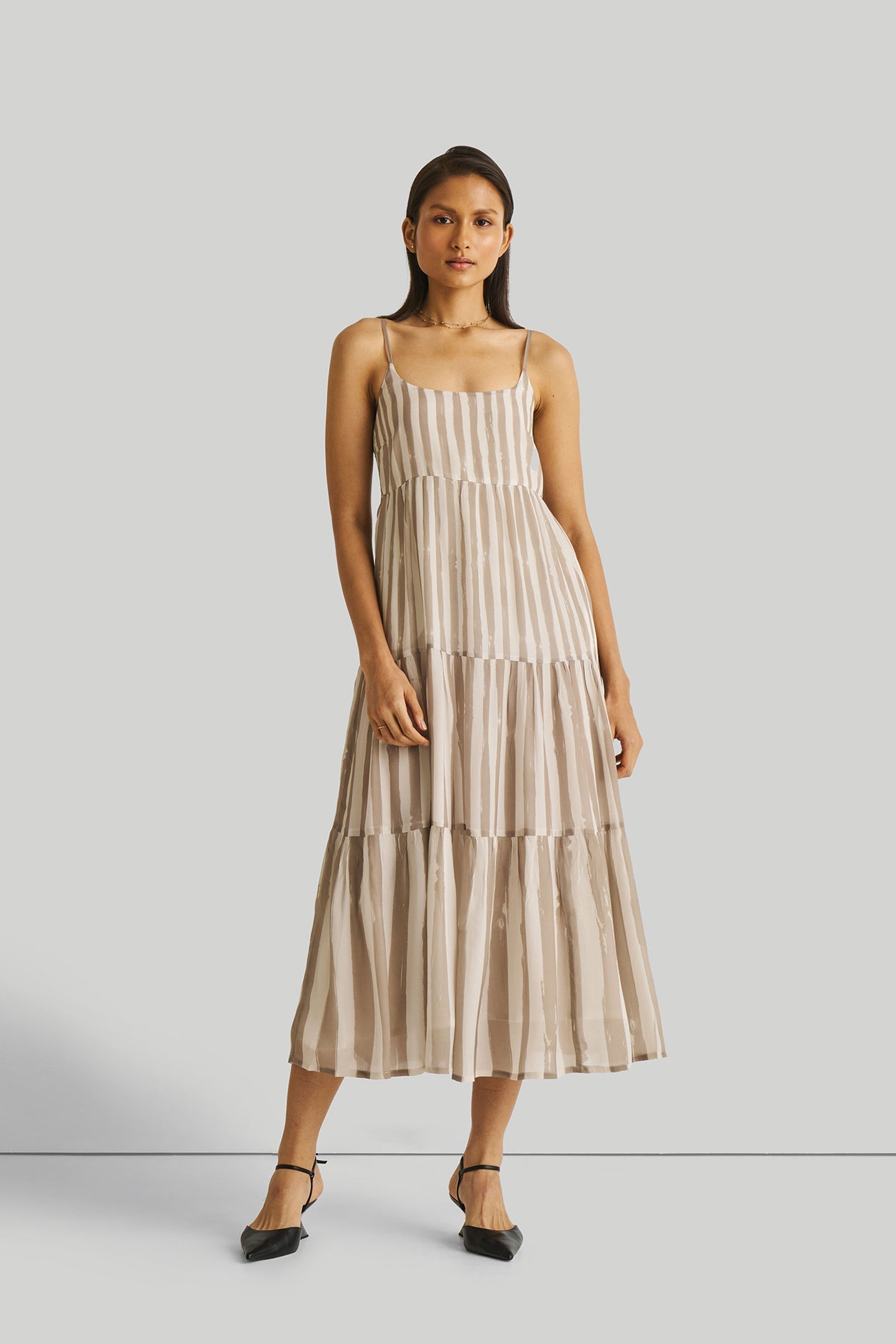 Buy Strappy Tiered Maxi Dress in Beige Stripes | Color: Striped down beige | Size: XL Refurbished - $171.00 Strappy Tiered Maxi Dress in Beige Stripes | Color: Striped down beige | Size: XL Refurbished - Resistor (Note: This is a generic term for an electronic component, refurbished available on Cerqular