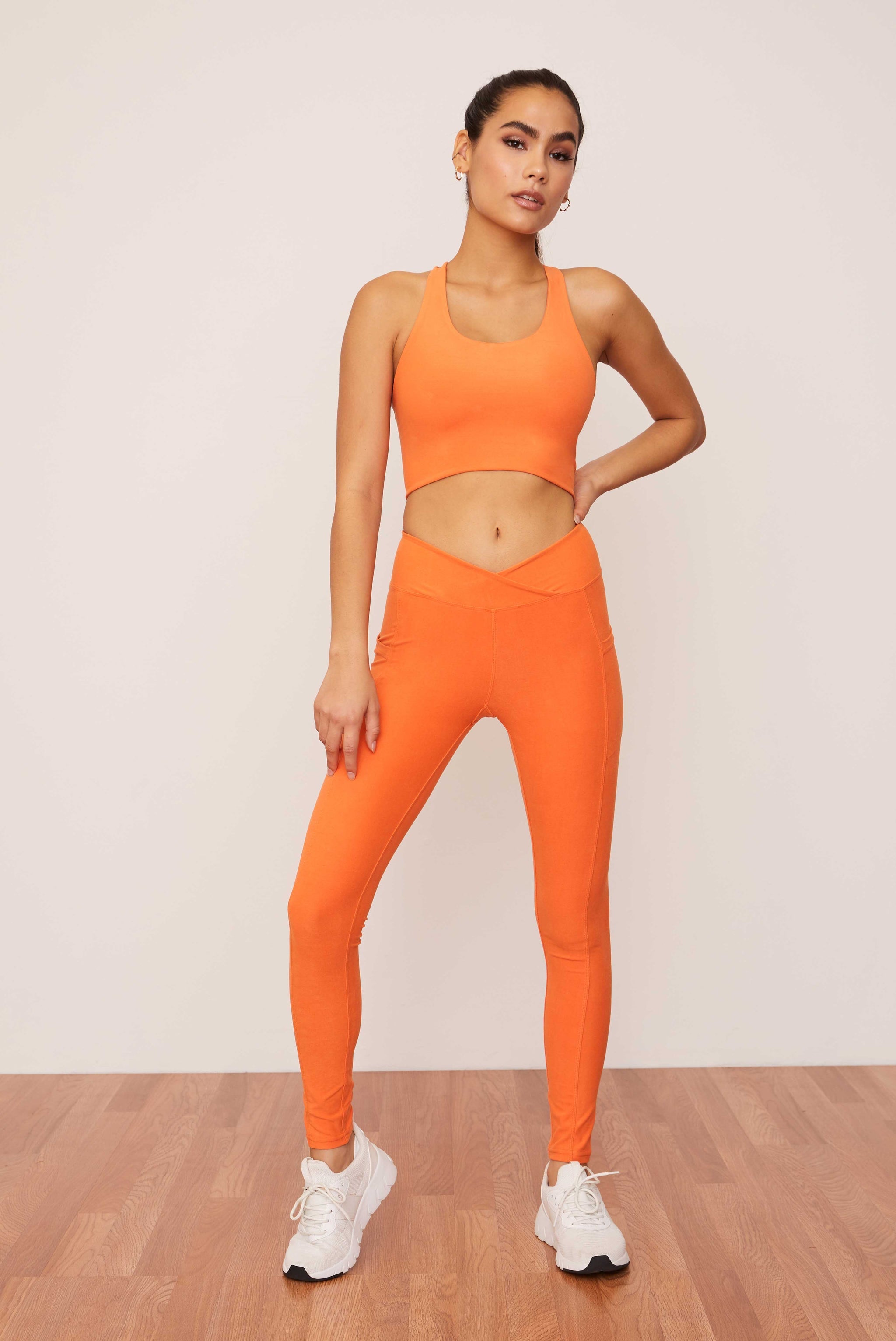 Buy Tangerine Ruched Crossover Pocket Legging | Size: XXL | Color: Tangerine | Style: Crossover Waistband Refurbished - $34.00 Tangerine Ruched Crossover Pocket Legging | Size: XXL | Color: Tangerine | Style: Crossover Waistband Refurbished - N/A (Note: There is a clothing brand called "Wolven refurbished available on Cerqular