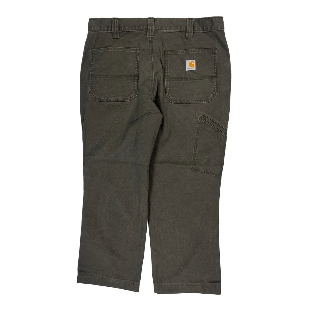 Buy Carhartt Trousers - 36W 30L Grey Cotton Refurbished - $77.71 Carhartt Trousers - 36W 30L Grey Cotton Refurbished - Thrifted (note: this is a term often used to describe second- refurbished available on Cerqular