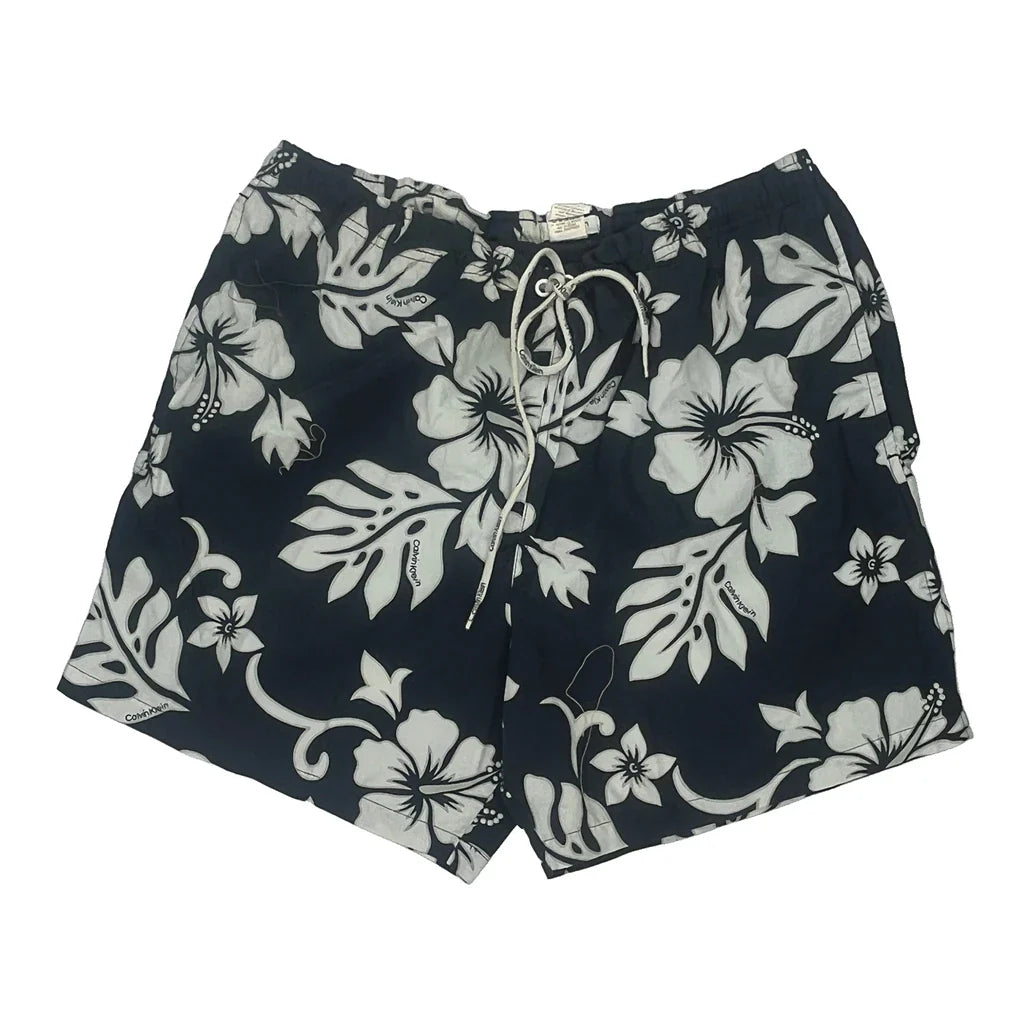 Buy Calvin Klein Floral Swim Shorts - Large Black & White Nylon Refurbished - $22.10 Calvin Klein Floral Swim Shorts - Large Black & White Nylon Refurbished - Thrifted (note: this is a term often used to describe second- refurbished available on Cerqular