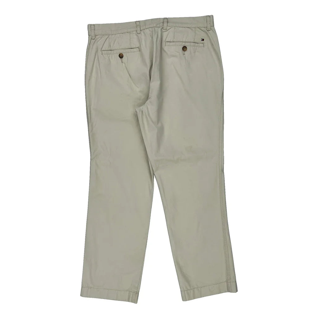 Tommy Hilfiger Slim Fit Chinos - 34W 30L Beige Cotton Refurbished - Thrifted (note: this is a term often used to describe second- refurbished available on Cerqular