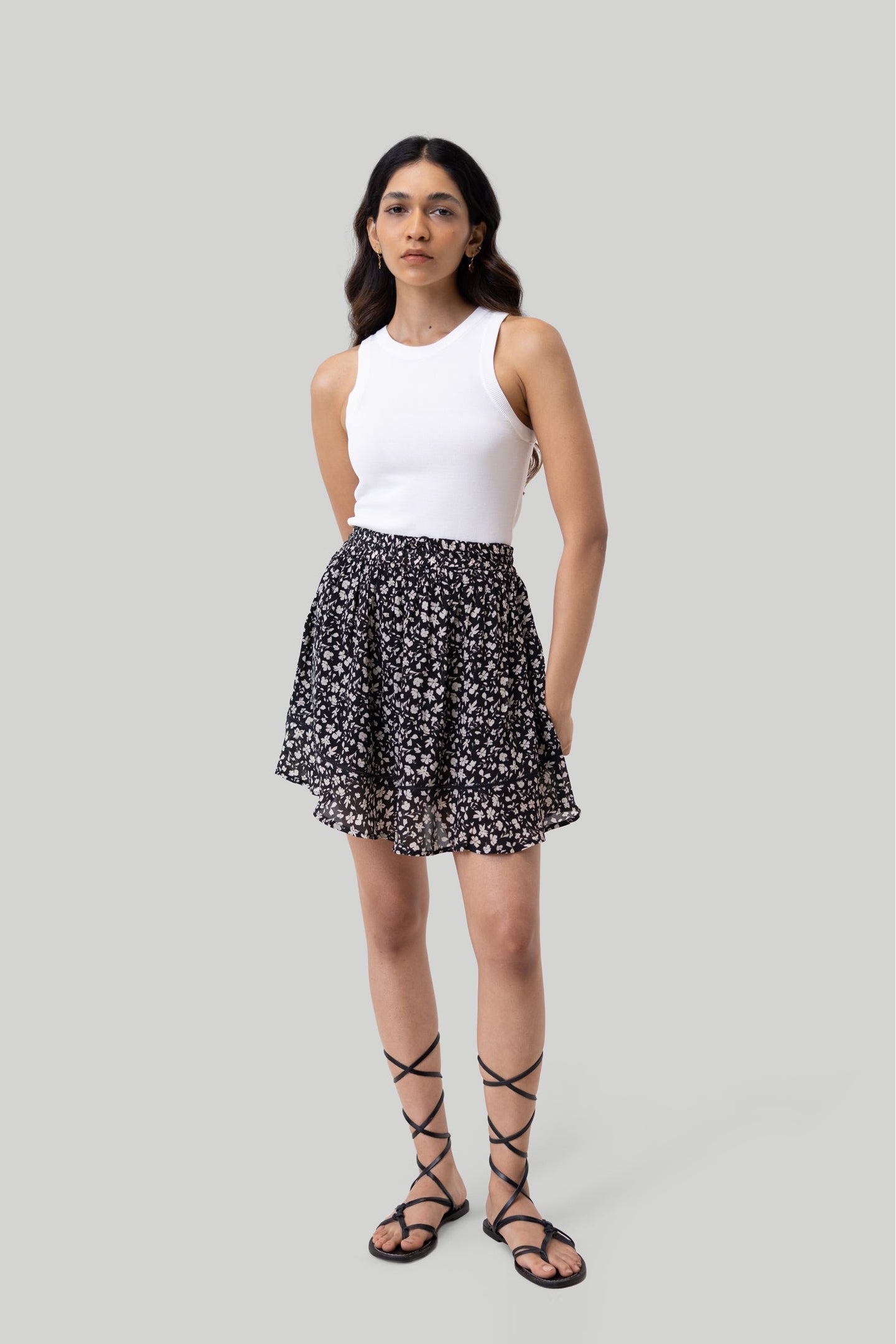 Drawstring Short Skirt in Black Floral | Color: Monochrome Medley | Size: M Refurbished - Resistor (Note: This is a generic term for an electronic component, refurbished available on Cerqular